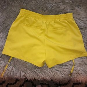 Bright yellow shorts with stretchy waist